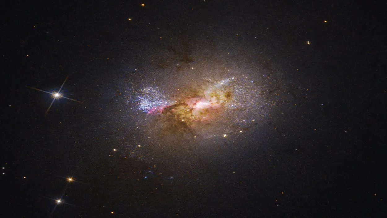 Черная дыра была обнаружена в центре карликовой галактики Генизе 2–10