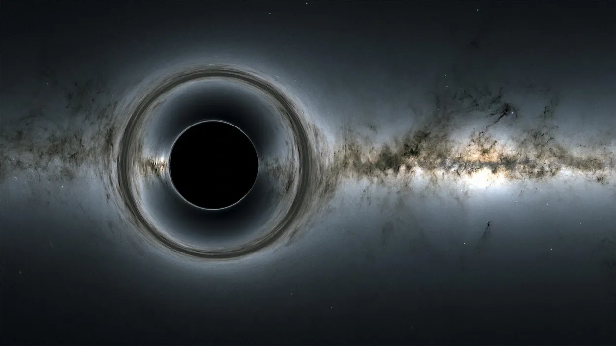 Одинокая черная дыра в космосе, гравитация которой искажает вид звезд и галактик